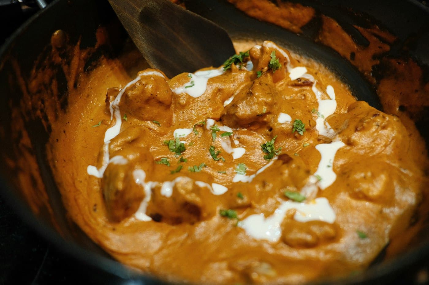 Creamy curry in a copper karahi